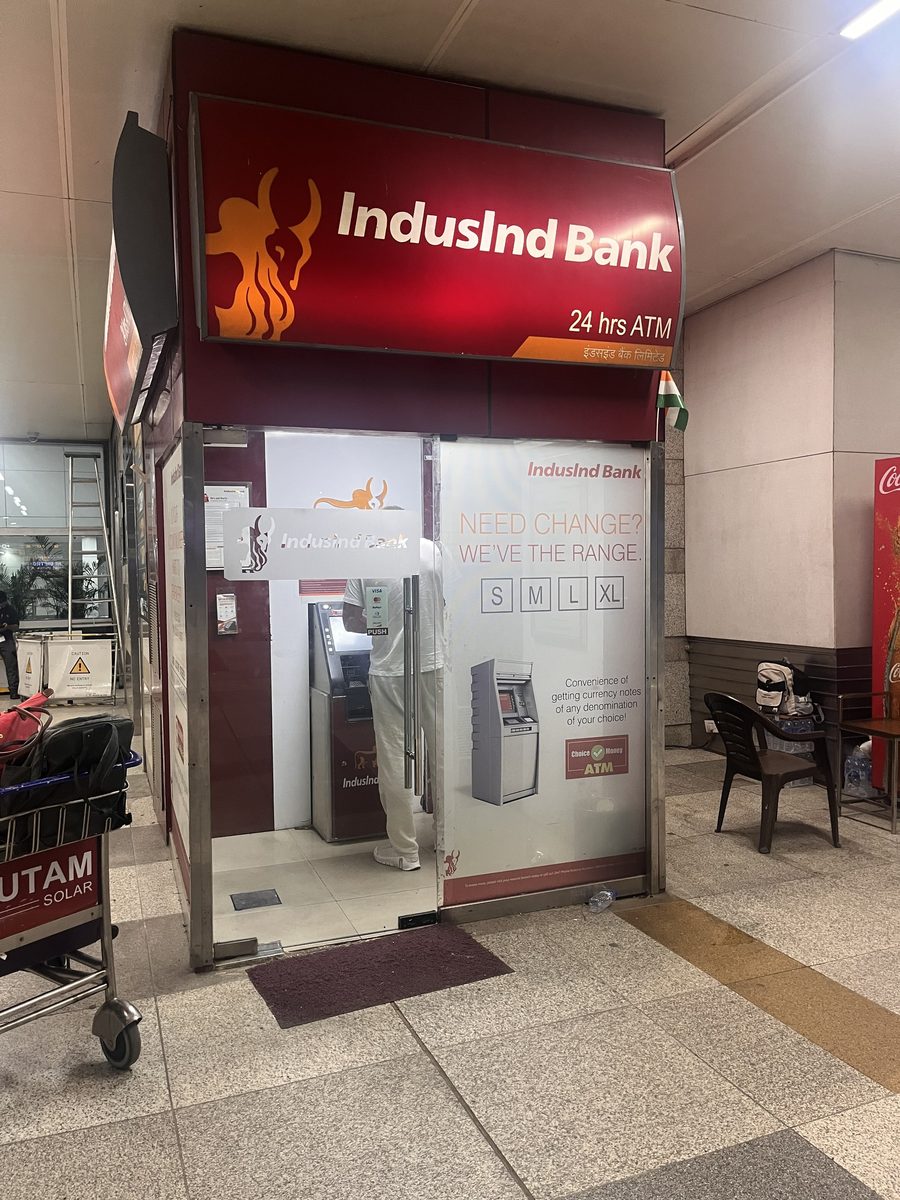 The IndusInd Bank 24 hour ATM booth outside the terminal